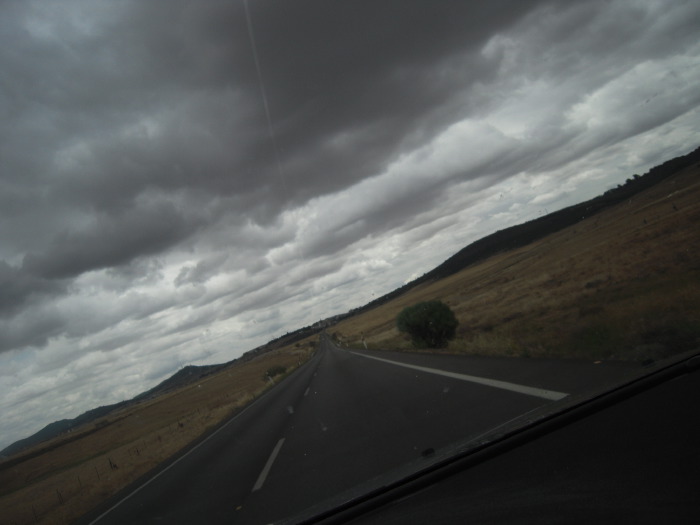 Cáceres al fondo